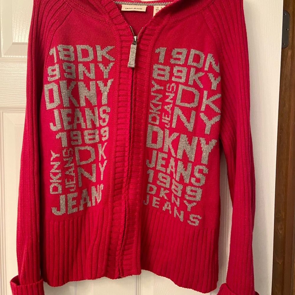 Like new woman’s long sleeved red zipper hooded DKNY sweater. XL